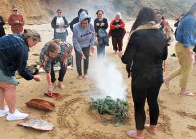 KMS workforce participate in the smoking ceremony